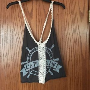 Graphic tank top with lace detail!